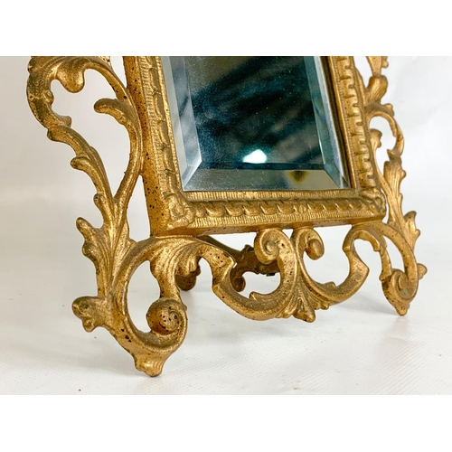 33 - A pair of late 19th century ornate framed table mirrors, 22.5cm x 30cm