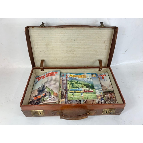 339 - A leather case containing vintage railway magazines.