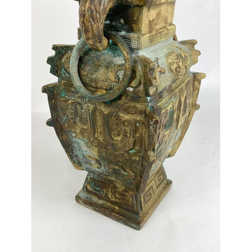 35 - A late 19th century heavy  ornate Chinese bronze vase, 13cm x 30cm