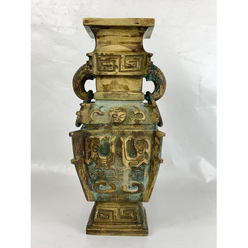 35 - A late 19th century heavy  ornate Chinese bronze vase, 13cm x 30cm