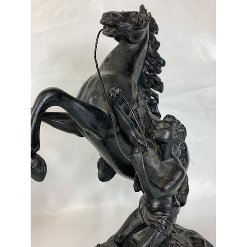 36 - A pair of late 19th century Marley Horse figures, 34cm x 42cm