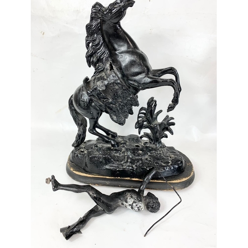 36 - A pair of late 19th century Marley Horse figures, 34cm x 42cm