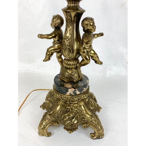 361 - A large brass and marble lamp.  88cm