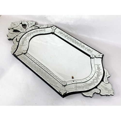 37 - A large Venetian style mirror, 51cm x 120cm