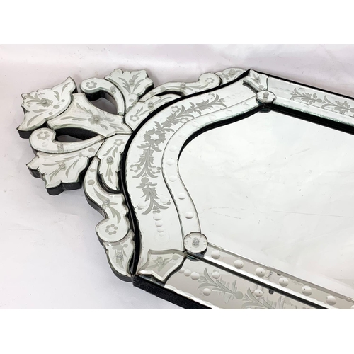 37 - A large Venetian style mirror, 51cm x 120cm