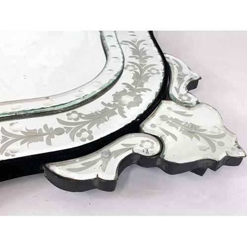 37 - A large Venetian style mirror, 51cm x 120cm