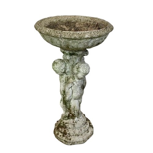 378 - A vintage concrete bird bath.  75cm