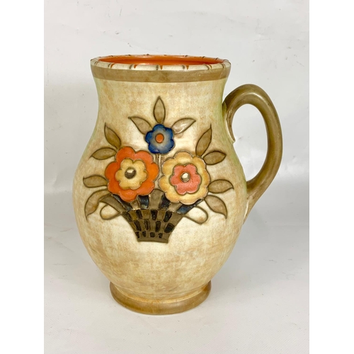 393 - A Charlotte Rhead pot with handle for Crown Ducal.  Pattern number 146.  22 x 20 cm