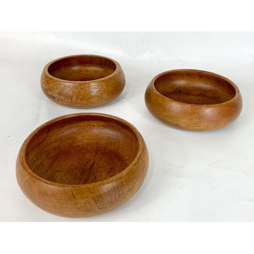 40 - A set of 4 1960s teak bowls, 25cm x 10cm