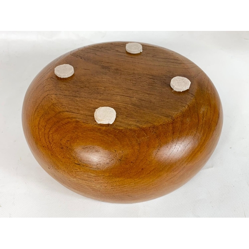 40 - A set of 4 1960s teak bowls, 25cm x 10cm