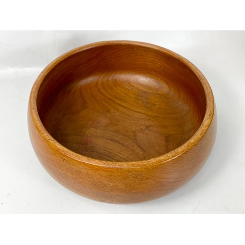 40 - A set of 4 1960s teak bowls, 25cm x 10cm