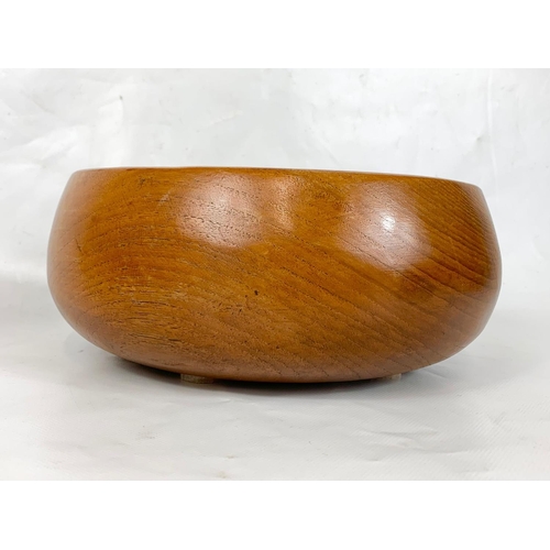 40 - A set of 4 1960s teak bowls, 25cm x 10cm