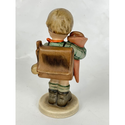 438 - An M.J. Hummel Goebel pottery figure, 