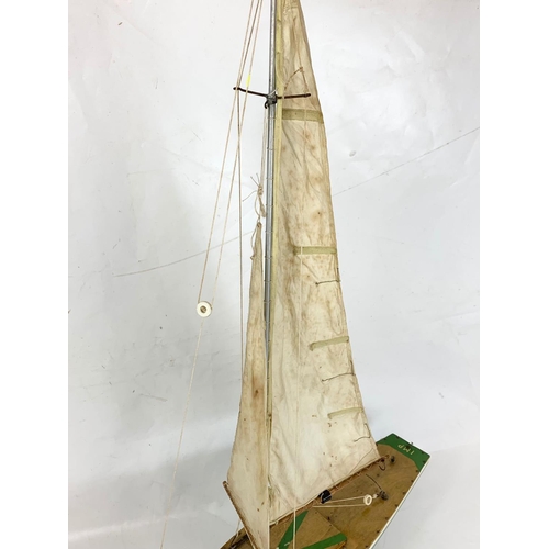 44 - A vintage pond yacht on stand, circa 1950. 66cm x 112cn