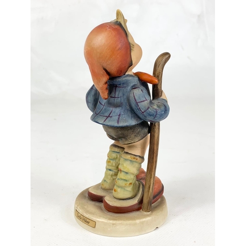 442 - An M.J. Hummel Goebel pottery figure, 