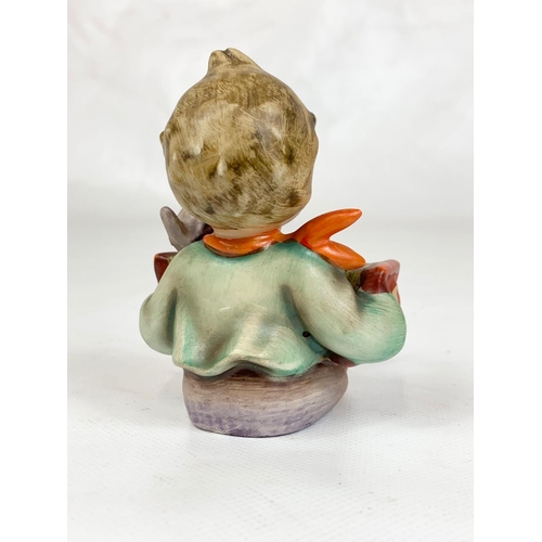 443 - An M.J. Hummel Goebel pottery figure, 