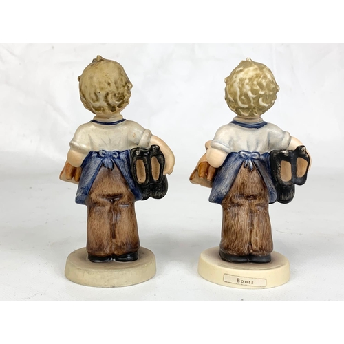 444 - Two M.J. Hummel Goebel pottery figures, 