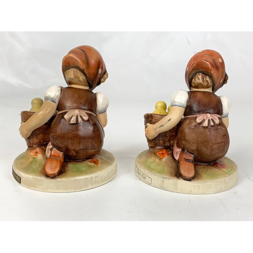 450 - Two M.J. Hummel Goebel pottery figures, 