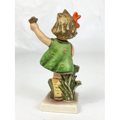 458 - An M.J. Hummel Goebel pottery figure, 