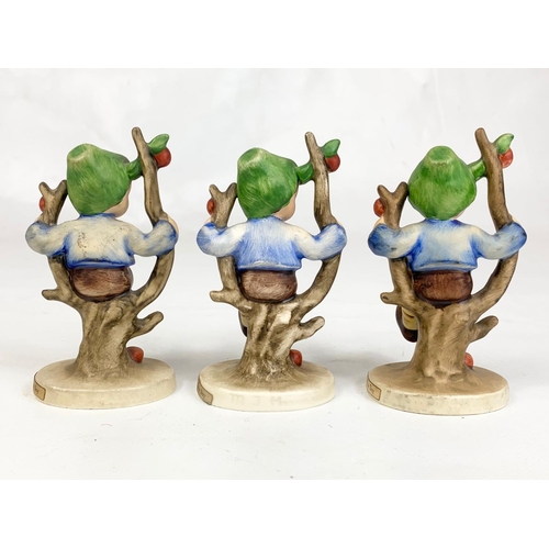 461 - Three M.J. Hummel Goebel pottery figures, 