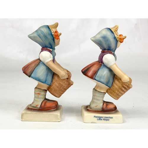 463 - Two M.J. Hummel Goebel pottery figures, 