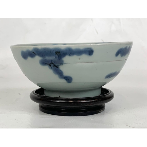 469 - A 19th century Chinese designed porcelain bowl on stand. 12cm x 5.5cm