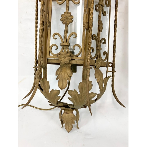 53 - A large early 20th century ornate porch lamp in the Neo Gothic style with matching wall light fixtur... 