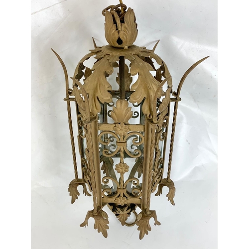 53 - A large early 20th century ornate porch lamp in the Neo Gothic style with matching wall light fixtur... 