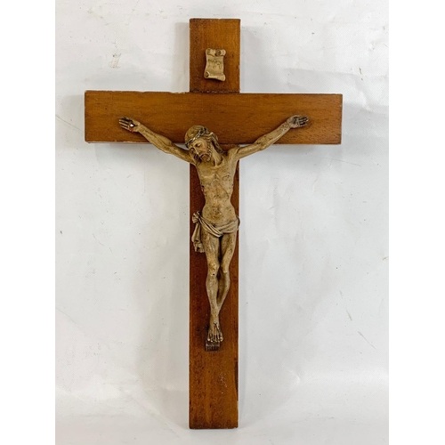 58 - A vintage crucifix, 25cm x 40cm