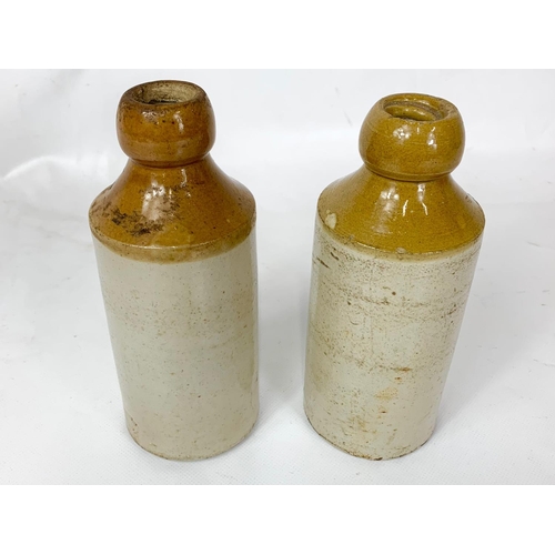 6 - 2 vintage stoneware bottles, 17cm