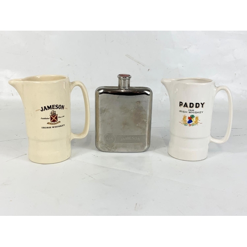 2 water pub jugs and a Jamison whiskey flask.