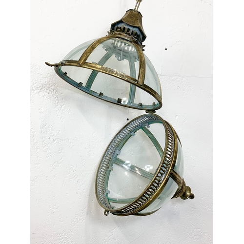 62 - An ornate brass light fixture, 43cm