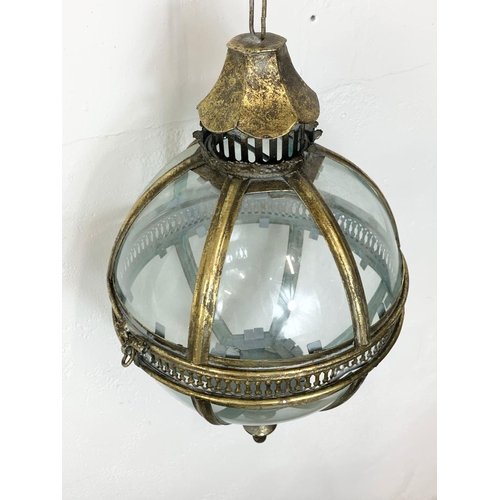 62 - An ornate brass light fixture, 43cm