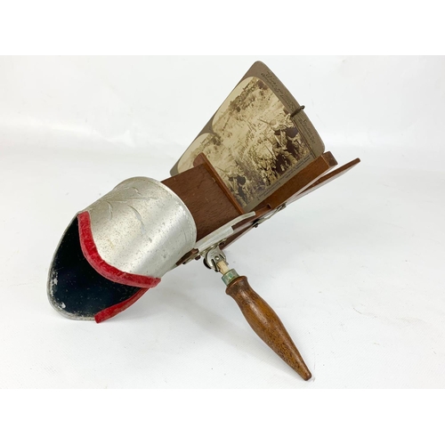 64 - A stereoscope with pictures depicting Boar War battle scenes etc and Lord Roberts.