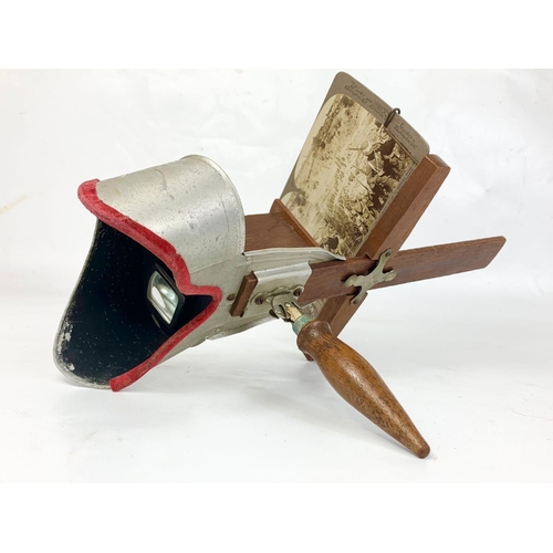 64 - A stereoscope with pictures depicting Boar War battle scenes etc and Lord Roberts.