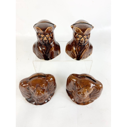 68 - Late 19th century Staffordshire Pottery money boxes in with treacle glaze, 10cm