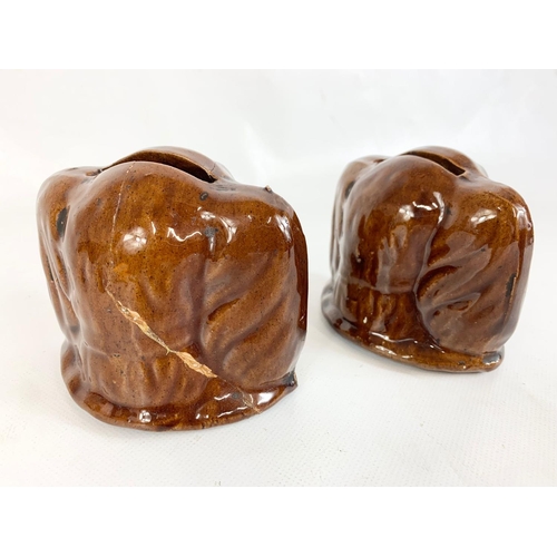 68 - Late 19th century Staffordshire Pottery money boxes in with treacle glaze, 10cm