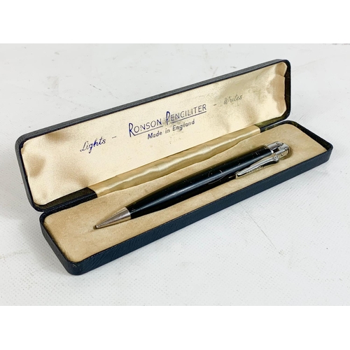 695 - A vintage Ronson Penciliter in case.