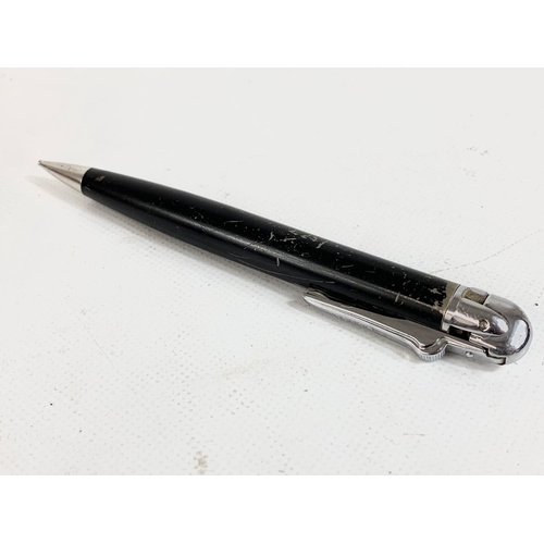 695 - A vintage Ronson Penciliter in case.