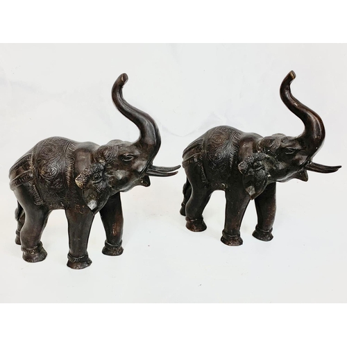 70 - A pair of large late 19th century Burmese bronze  elephants, 32cm x 31cm