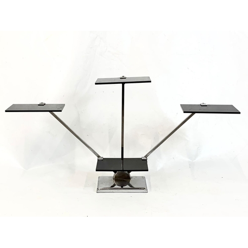 72 - An Art Deco chromed brass display stand 1950, 45.5cm x 86.5cm