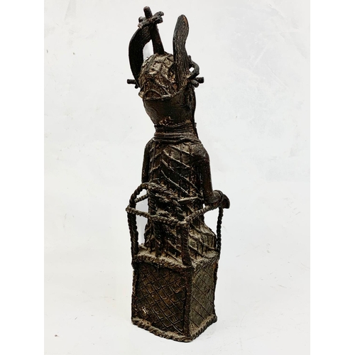 73 - A vintage Benin bronze figure, 37cm