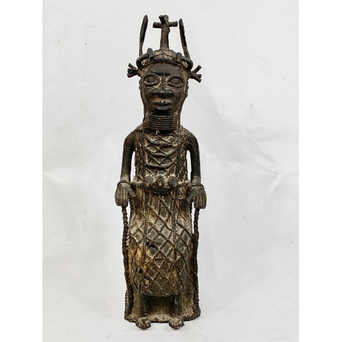 73 - A vintage Benin bronze figure, 37cm