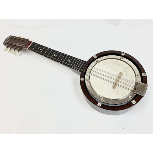 78 - A vintage banjolele in case