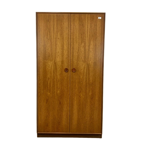 789 - Teak Mid Century two door wardrobe by Meredew. 90cm x 56.5cm x 171.5cm