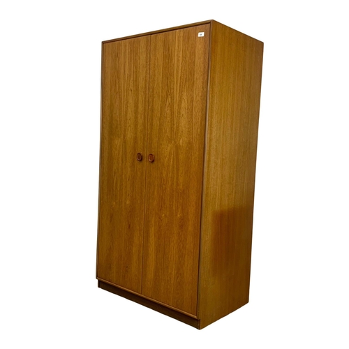 789 - Teak Mid Century two door wardrobe by Meredew. 90cm x 56.5cm x 171.5cm