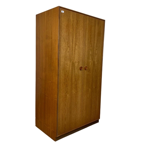 789 - Teak Mid Century two door wardrobe by Meredew. 90cm x 56.5cm x 171.5cm