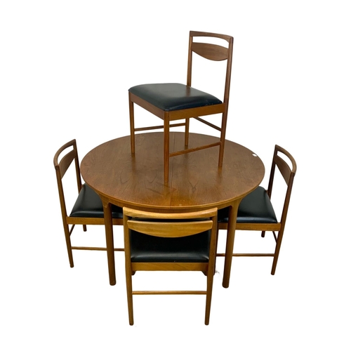 790 - McIntosh teak Mid Century extending table and four chairs