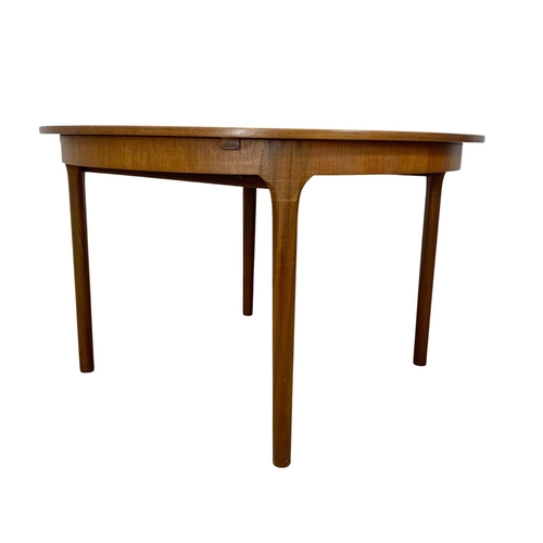 790 - McIntosh teak Mid Century extending table and four chairs