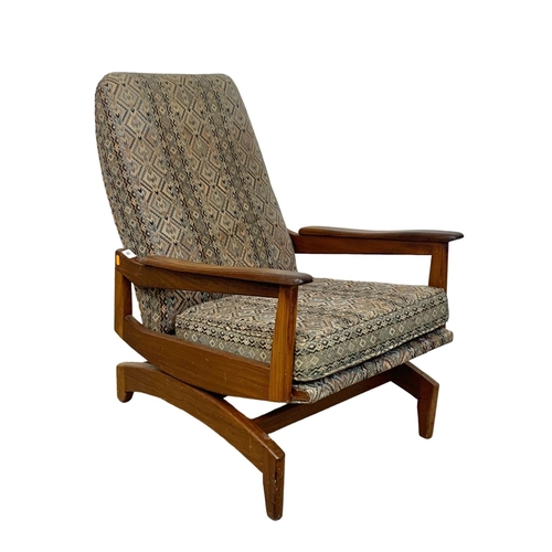 792 - Teak Mid Century rocking chair. 63cm x 96cm x 84cm